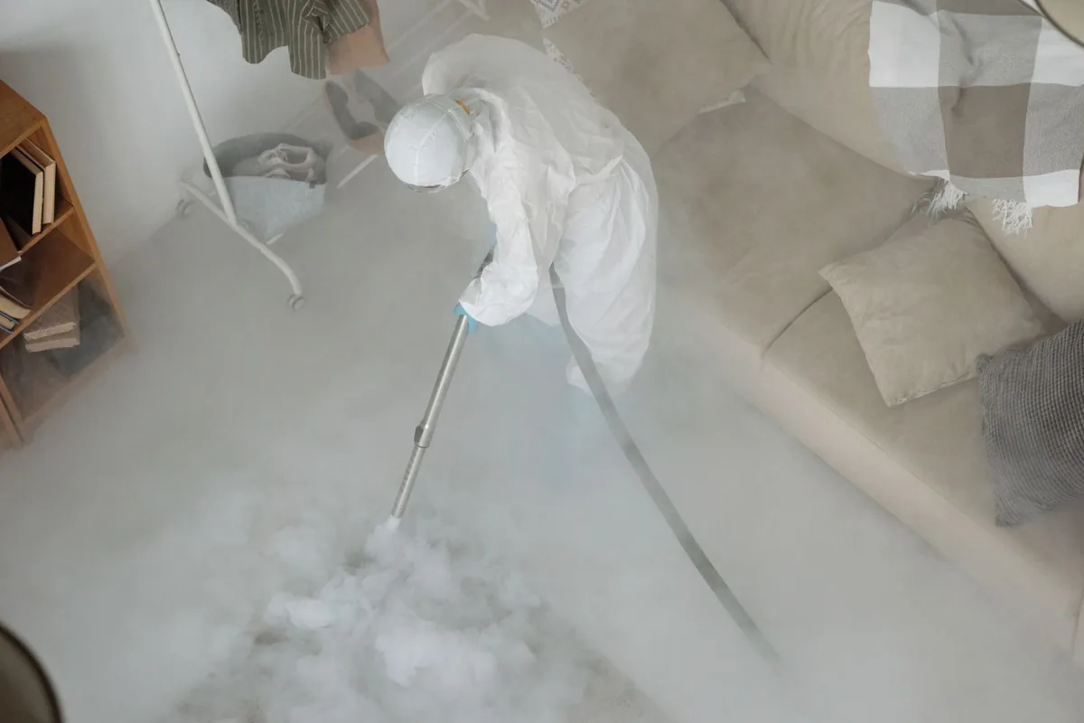 Biohazard cleanup technician in protective equipment, Fair Oaks, GA